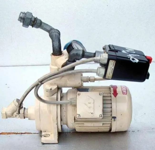 Tankstelle Fuellstation Schlauchabroller Bild 1